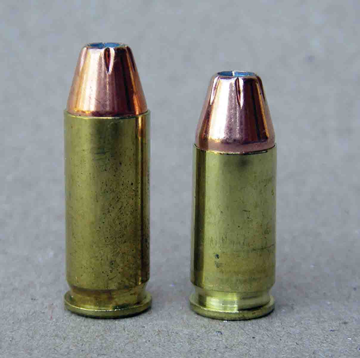 The .38 Super (left) offers a notable powder capacity increase over the 9mm Luger (right), resulting in substantial velocity increases.